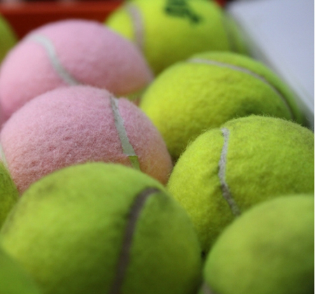 pink and green tennis balls
